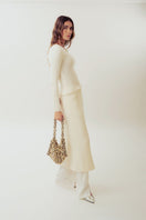 Beige Alya off-white shoulder bag with sequins from Millanne Tale, featuring a stylish design and adjustable strap.