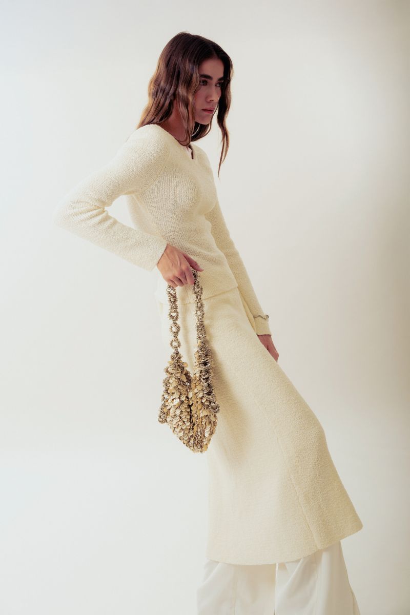 Off-white Alya shoulder bag by Millanne Tale with beige sequins, featuring a stylish design and elegant strap.