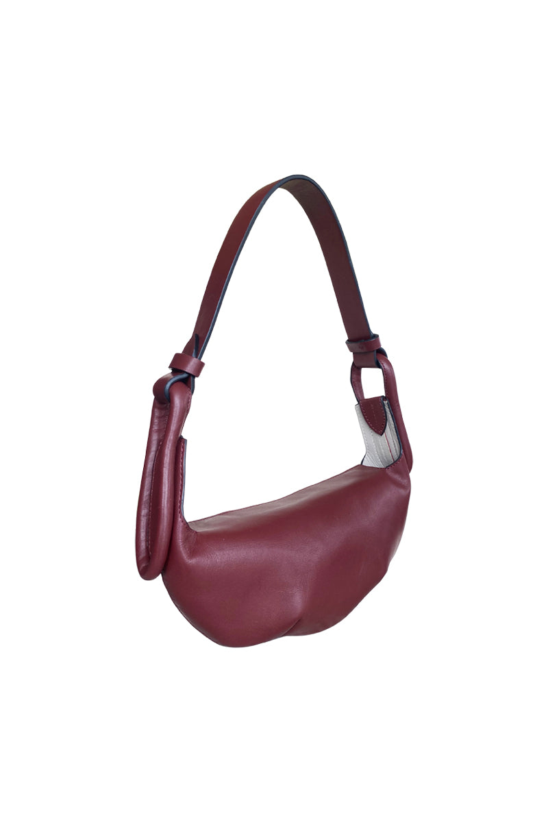 ISIDORA MALVA Amalfi Mini shoulder bag in burgundy leather with sleek design and compact size.