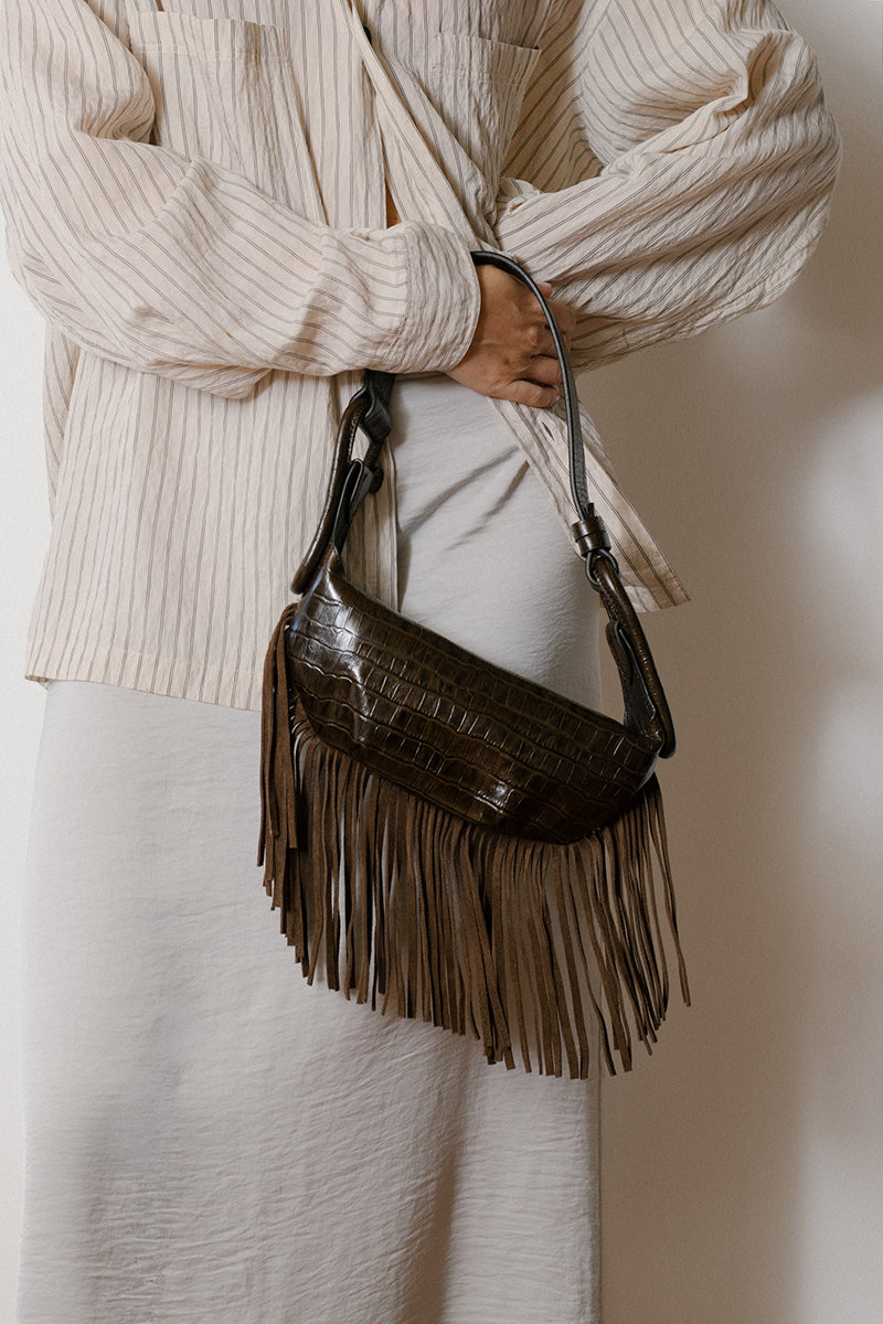 ISIDORA MALVA Amalfi mini shoulder bag with crocodile-patterned leather and fringes, stylish and compact accessory.