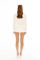 White Amber mini skirt by Nana Jacqueline, featuring a stylish, fitted design perfect for casual or dressy outfits.