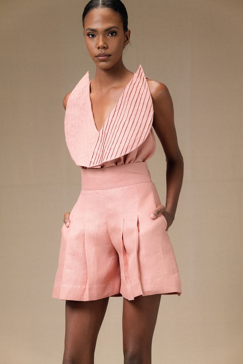 ANA + MARIA Amelie shorts in dark salmon, lightweight casual shorts with a relaxed fit, shown on a model.