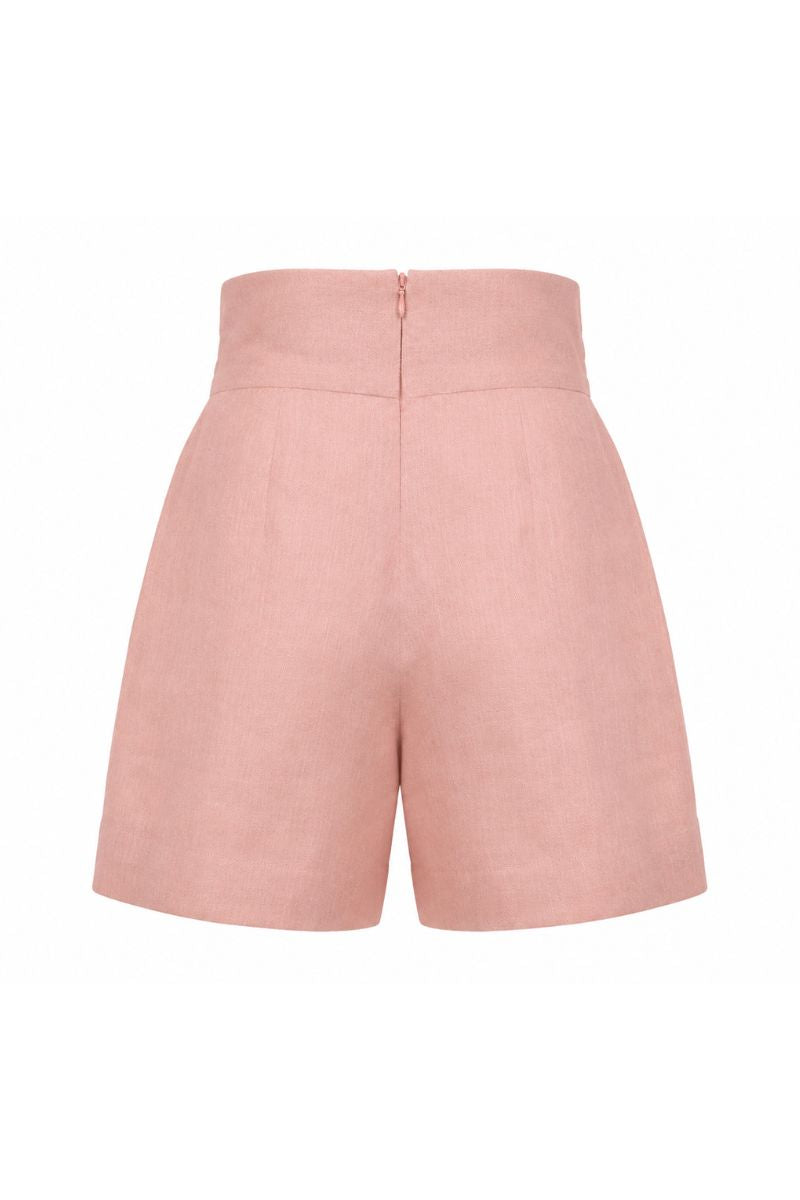 Dark salmon Amelie shorts by ANA + MARIA displayed on a white mannequin, showcasing the stylish design and fit.