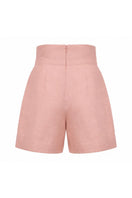 Dark salmon Amelie shorts by ANA + MARIA displayed on a ghost mannequin, showcasing their relaxed fit and vibrant color.