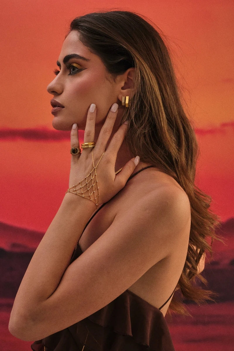 Gold Amina Hex Paved Hoop Earrings by Velvet Desert, featuring geometric hex design with shimmering pave details.