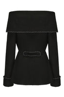 Black Armor jacket by Nana Jacqueline, shown from the back with a sleek, fitted design and stylish detailing.