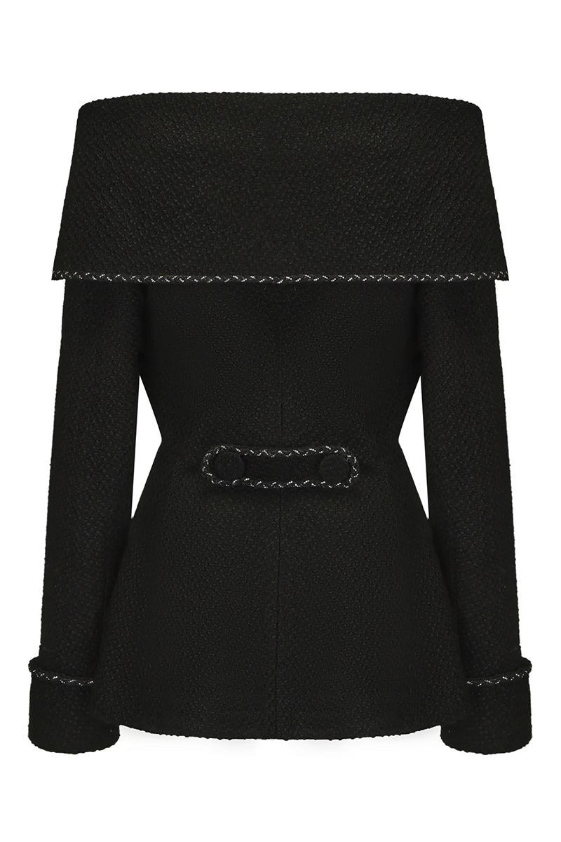 Black Armor jacket by Nana Jacqueline, shown from the back with a sleek, fitted design and stylish detailing.