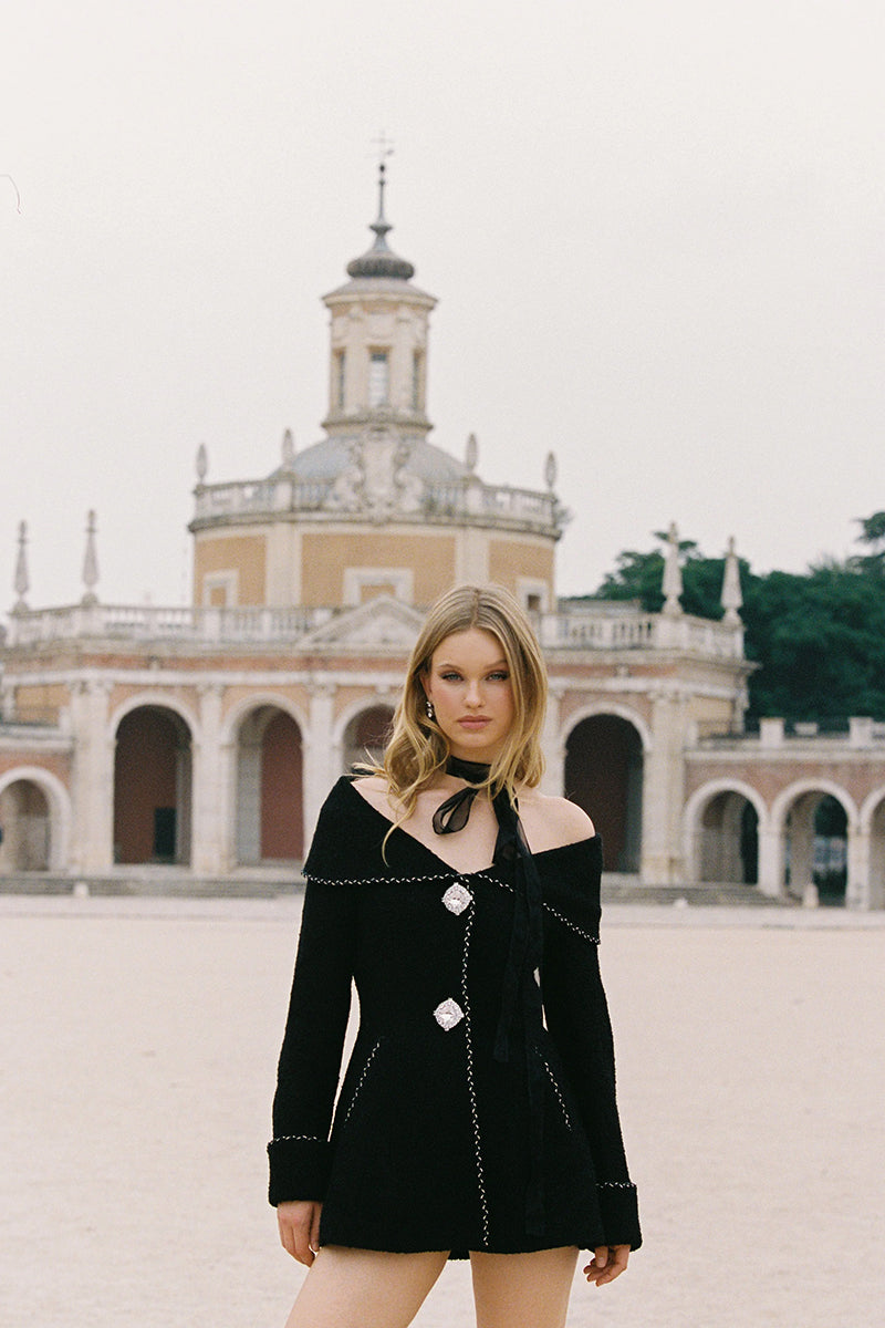 Black Armor Jacket by Nana Jacqueline featuring a sleek, structured design with modern detailing and a fitted silhouette.