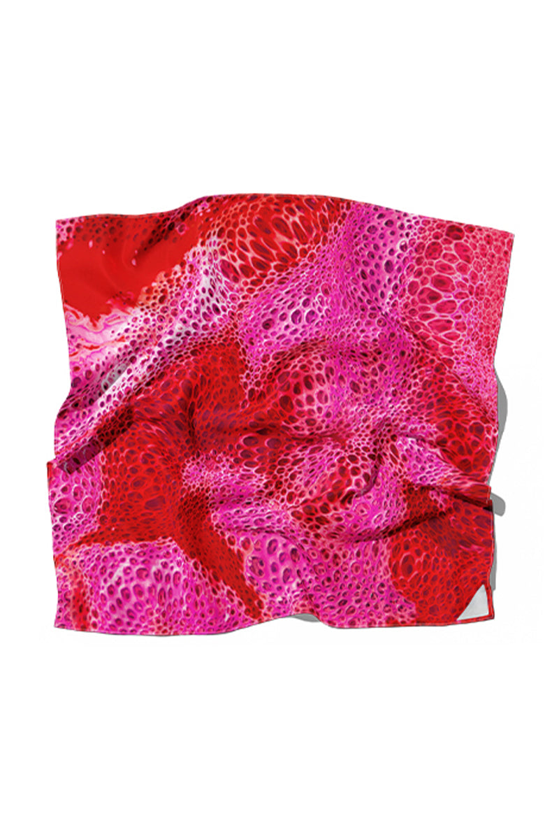 Amel Batita Amore Moussard silk scarf featuring vibrant floral patterns and elegant draping.