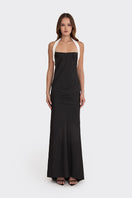 Black Angeline maxi dress by Stolen Stores, flowing fabric and elegant design, shown on a model.