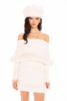 White Nana Jacqueline Anika knit top displayed on a model, showcasing its soft texture and stylish fit.