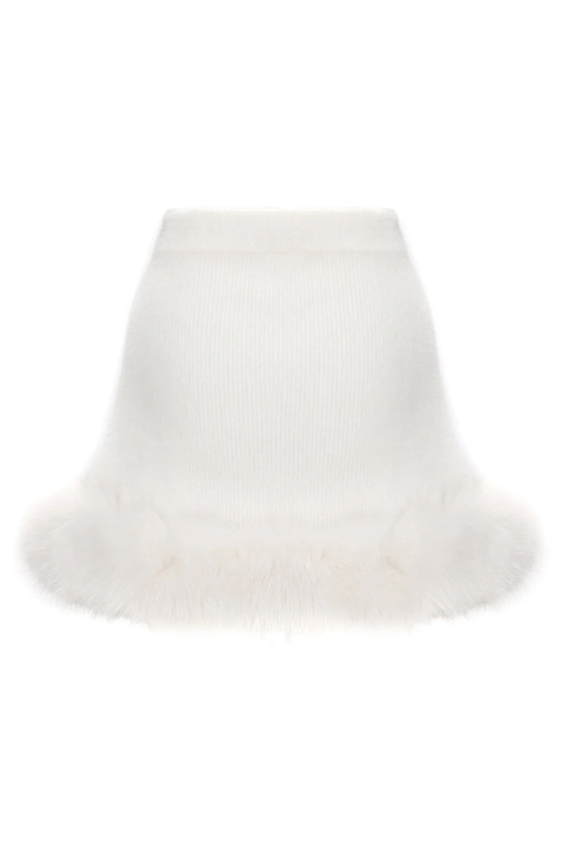 Nana Jacqueline Anika white mini skirt shown from the back, featuring a sleek design and fitted silhouette.