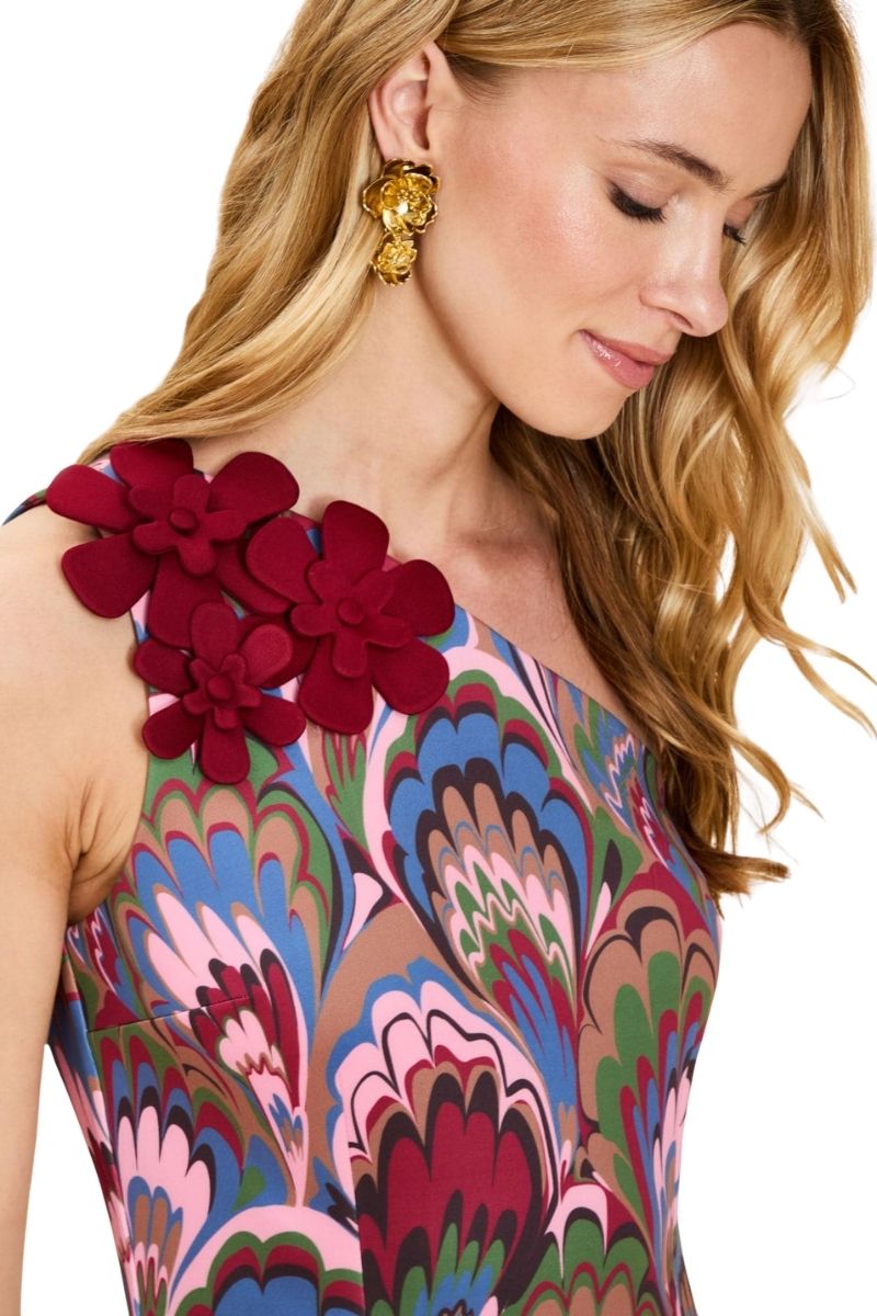 Mestiza New York Annmarie midi dress in flowy fabric with a fitted waist and elegant neckline, displayed on a hanger.