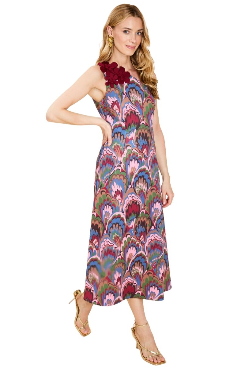 Mestiza New York Annmarie midi dress in flowy fabric with a fitted waist and elegant neckline, showcased on a model.