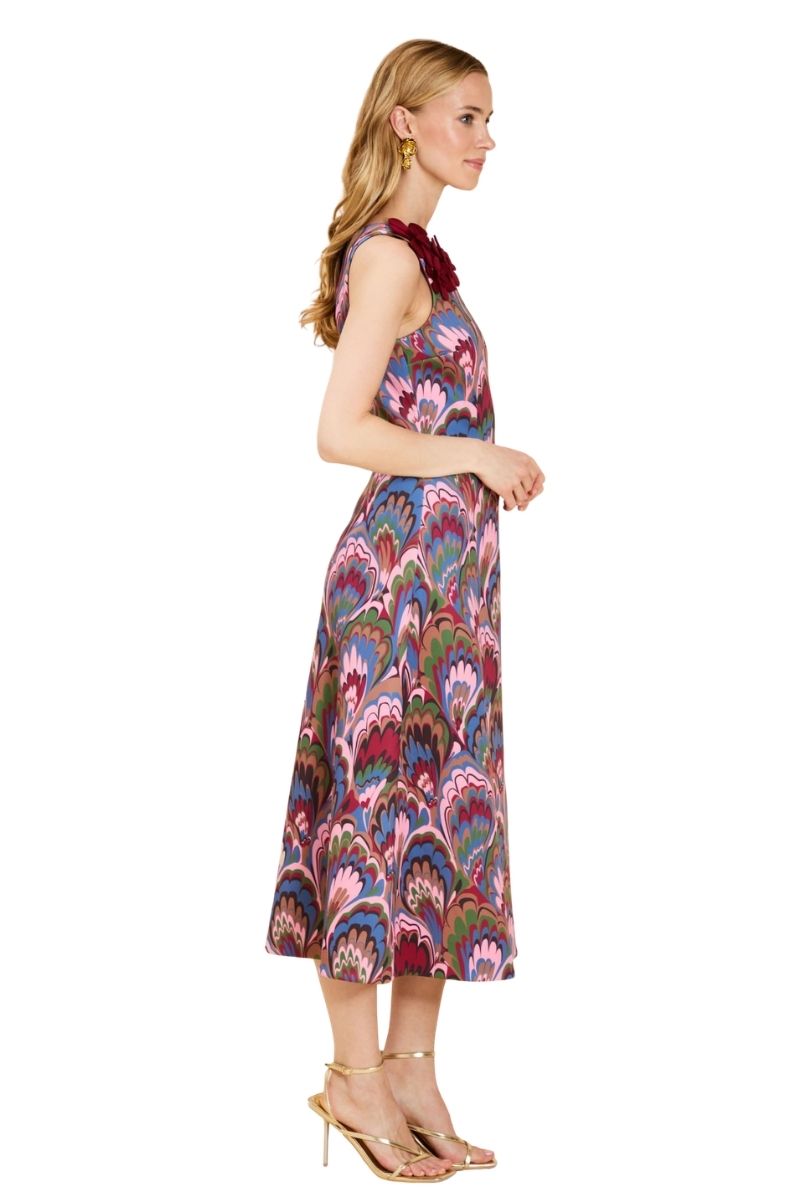 Mestiza New York Annmarie midi dress in flowy fabric with a fitted waist and elegant design, showcased on a model.