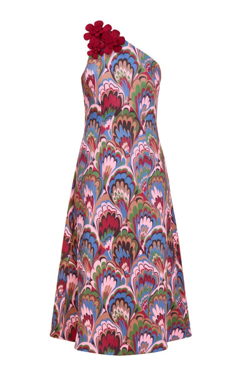 Mestiza New York Annmarie midi dress in flowing fabric with a fitted waist and elegant neckline, displayed on a hanger.