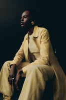 ZUT butter yellow Antar coat, stylish and warm outerwear with a tailored fit, shown on a model.
