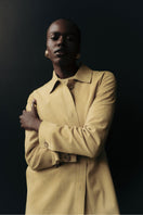 ZUT Antar coat in butter yellow, stylish lightweight coat with a tailored fit and button details, perfect for spring.
