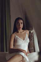 Ivory silk nightgown with bust support from NK IMODE, featuring a long, elegant design perfect for sleepwear or special occasions.