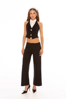 Nana Jacqueline Anya black pants featuring a tailored fit, shown on a model with a stylish, minimalist look.