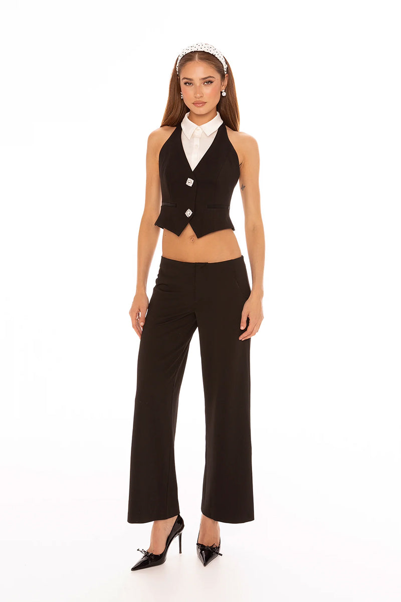 Nana Jacqueline Anya black pants featuring a tailored fit, shown on a model with a stylish, minimalist look.
