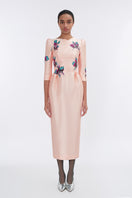 Apricot blush sculpted V-neck pegged midi dress by Tiny Ink, featuring a fitted waist and elegant design.