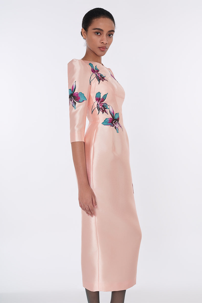 Apricot blush sculpted V-neck pegged midi dress by Tiny Ink, featuring a fitted waist and elegant hemline.