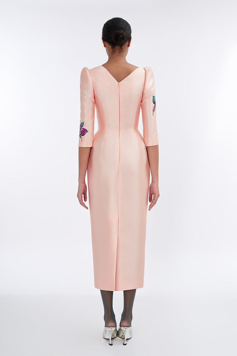 Apricot blush sculpted V-neck pegged midi dress by Tiny Ink, featuring a fitted waist and elegant design.