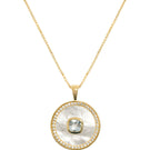 Gold vermeil March aquamarine and mother-of-pearl necklace by Freya Rose featuring a delicate pendant and elegant chain.