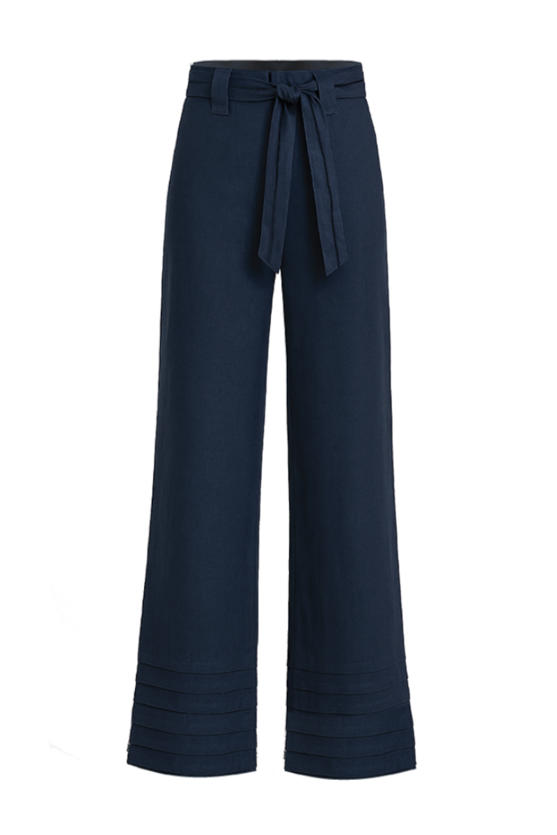 Navy blue ANA + MARIA Ara pants displayed on a mannequin, showcasing their stylish fit and fabric texture.