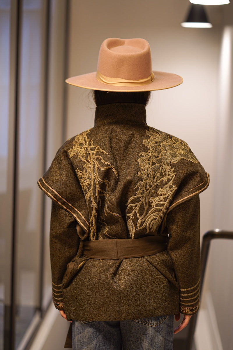 Nadya Shah Arcadian Tie Belt Jacket showing the back with a tied belt, stylish jacket with a tailored fit and detailed stitching.