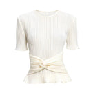 Off-white Arena T-shirt top by Maylé Vásquez featuring a casual, stylish shirt design with a comfortable fit.