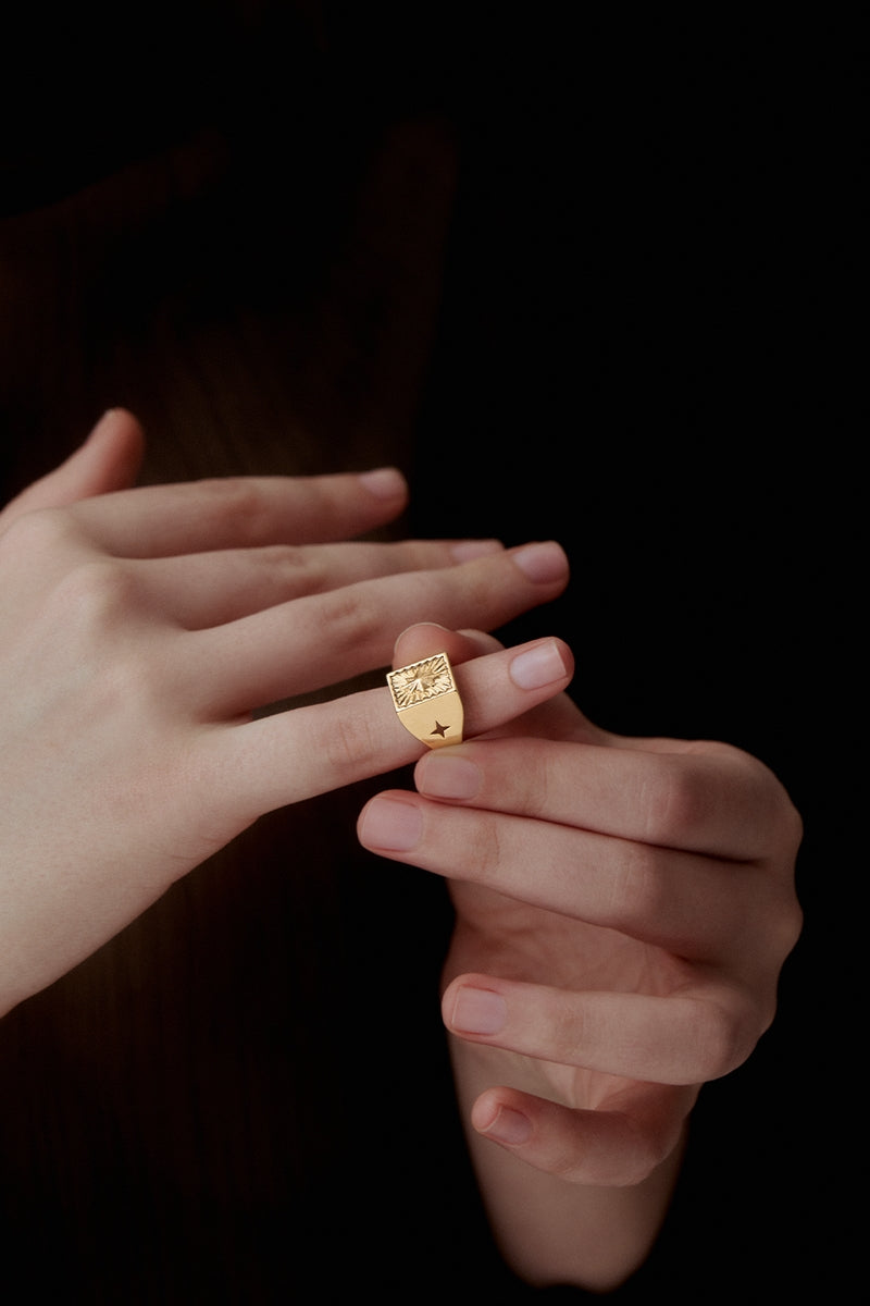 Maria Frering Arena Golden Pinky Ring featuring a sleek gold band designed for pinky finger wear.