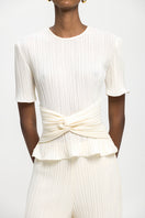 Maylé Vásquez Arena T-shirt top in off-white, casual shirt with a relaxed fit, showcased on a plain background.