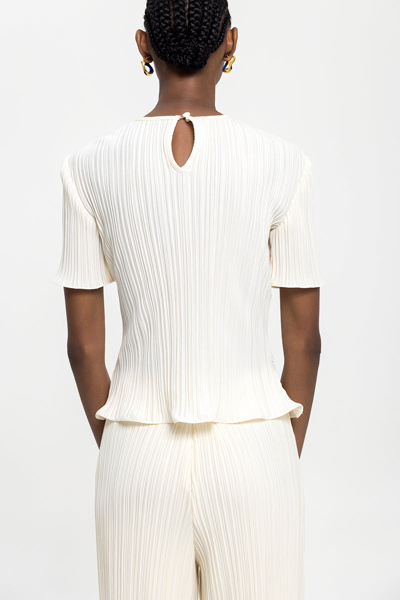 Off-white ARENA T-shirt top by Maylé Vásquez featuring a casual, stylish shirt design with a comfortable fit.