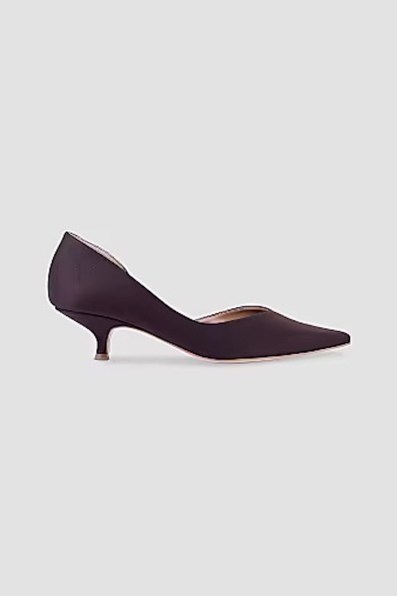A pair of AERA Ariana Brown eco satin heels with pointed toes and elegant heel design on a neutral background.