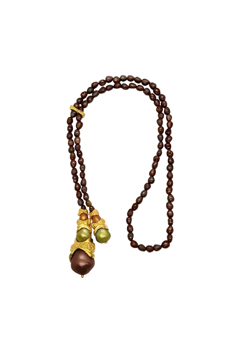 Brown cascade necklace by Jude Benhalim featuring layered chain design, displayed on a neutral background.