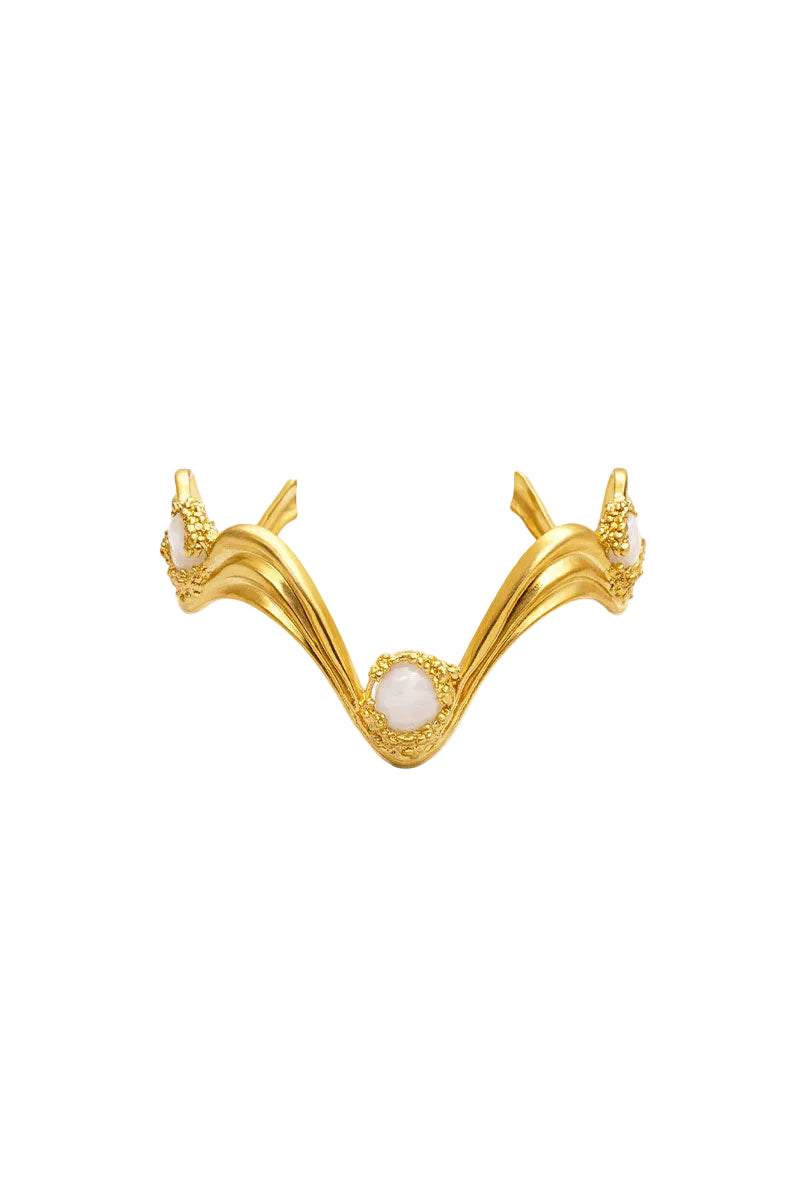 Gold and white gravity bracelet by Jude Benhalim featuring sleek, modern design with smooth metallic finish.