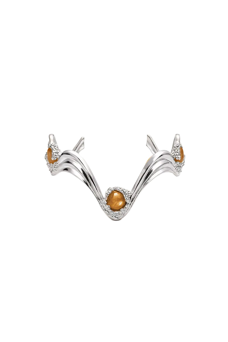 Silver and tan Gravity bracelet by Jude Benhalim featuring layered design and modern style on a white background.