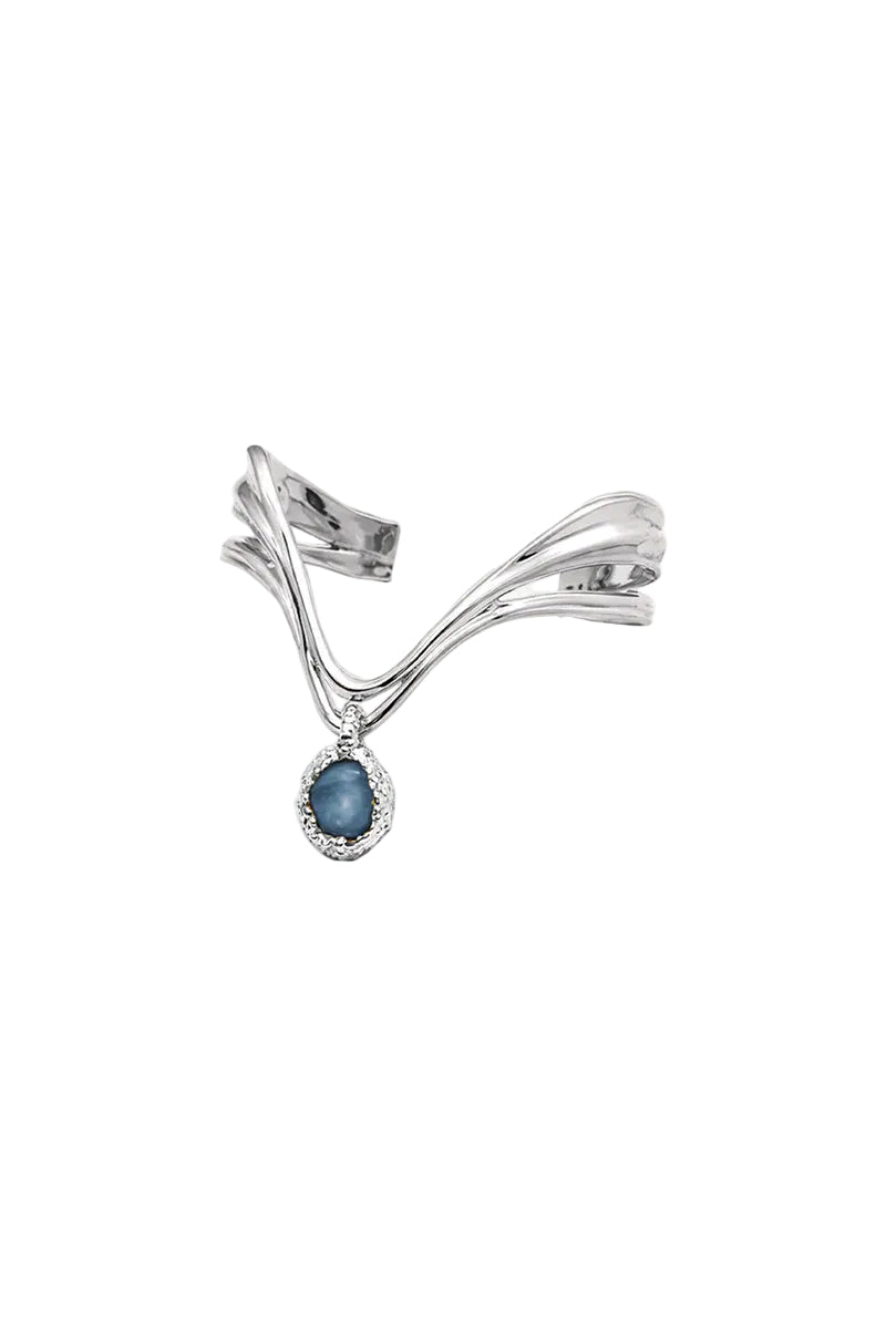 Silver and blue drape bracelet by Jude Benhalim featuring elegant, flowing design with intricate silver and vibrant blue accents.