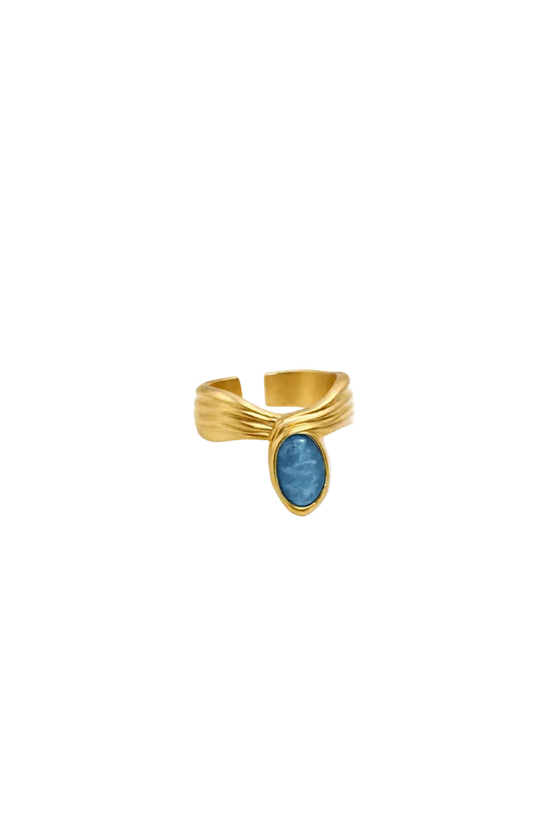 Gold and blue anchor ring by Jude Benhalim, featuring a stylish design with a polished gold band and vibrant blue accent.