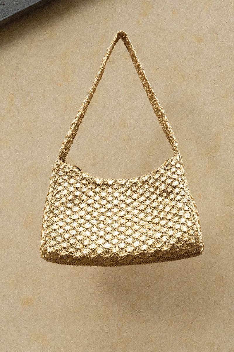 Gold Verdi Arista seashell shoulder bag with elegant design, featuring seashell accents and a stylish gold finish.