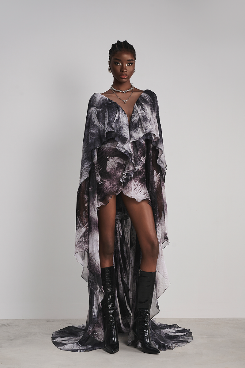 Black Le Thanh Hoa Soaring Doves maxi dress featuring flowing fabric and elegant design, perfect for formal or casual occasions.