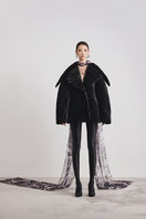 Black quilted coat by Le Thanh Hoa, stylish Nightfall design with a padded, cozy look perfect for cold weather.
