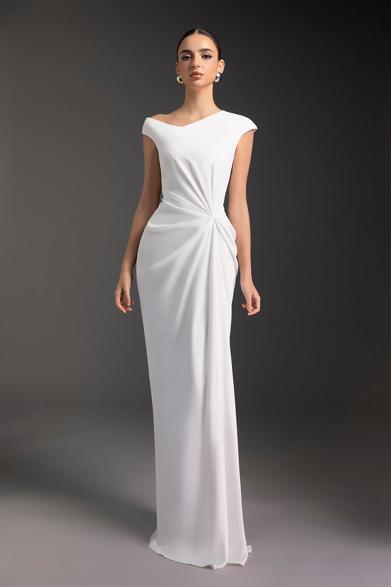 Elegant luminous pearl gown by Le Thanh Hoa featuring shimmering pearl details and flowing fabric, perfect for formal occasions.