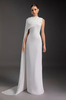 Elegant Le Thanh Hoa PURE ESSENCE GOWN featuring intricate details and flowing fabric, perfect for formal occasions.