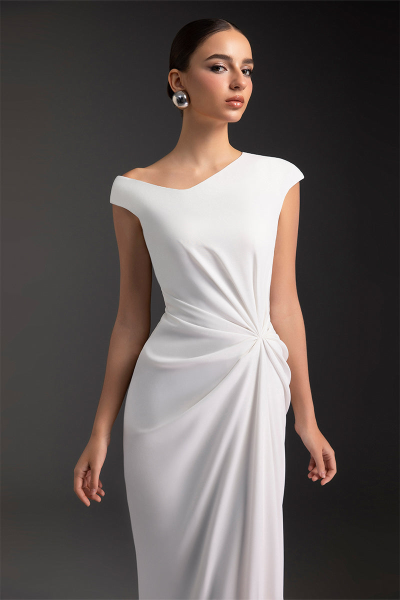 Elegant luminous pearl gown by Le Thanh Hoa featuring intricate detailing and a flowing silhouette.
