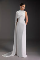 Elegant PURE ESSENCE GOWN by Le Thanh Hoa featuring flowing fabric and intricate design, perfect for formal occasions.