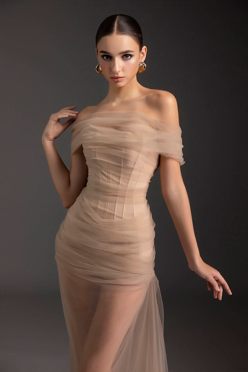 Le Thanh Hoa Blazing Desire gown featuring elegant fabric, intricate design, and flowing silhouette perfect for formal occasions.