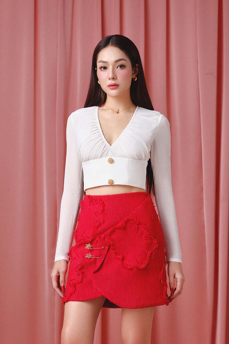 Do Long Brilliant Blossom co-ord set featuring a floral top and matching skirt, styled for a chic, coordinated look.
